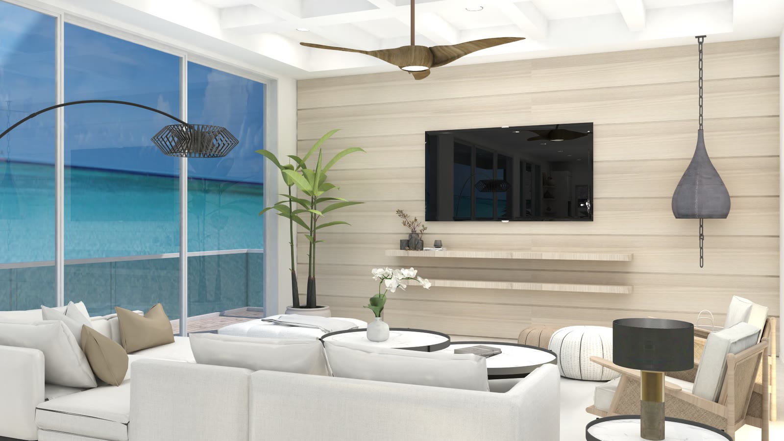 The great room: a horizontal timber media wall, white seating and full height glazing onto the water